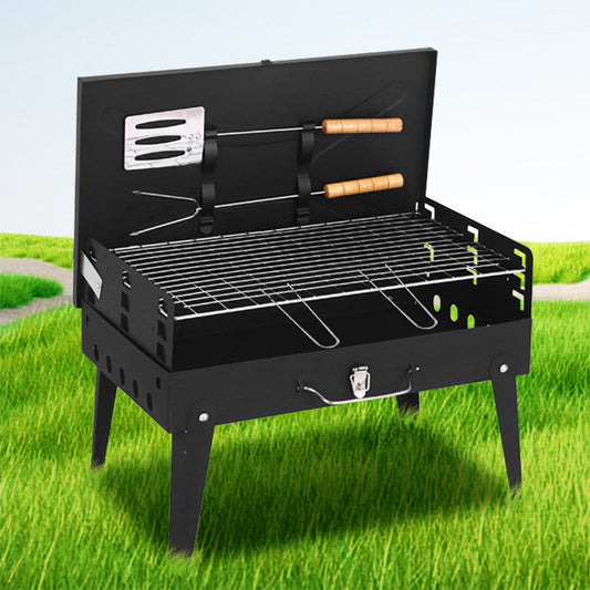 Tragbarer, klappbarer Holzkohlegrill für das Kochen im Freien