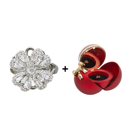 Glücksring mit drehendem vierblättrigem Kleeblatt